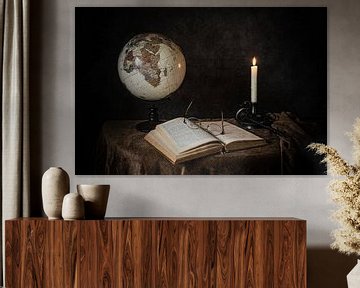 still life candle, book and globe by Mariette Kranenburg