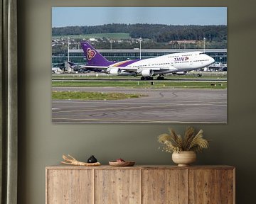 A Thai Airways Boeing 747-400 takes off from Zurich airport for a flight to beautiful and warm Thail by Jaap van den Berg