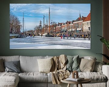 Plaisir de la glace sur le Dokkumer Ee gelé en Frise, aux Pays-Bas, en hiver. sur Eye on You