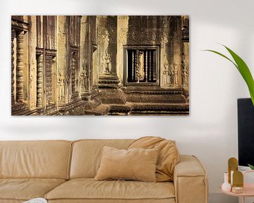 Beautiful wall in ochre yellow and brown colors with Apsaras in Angkor Wat by Dirk Verwoerd