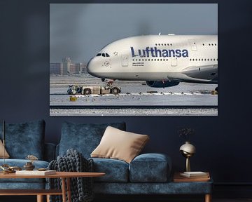 A large Lufthansa Airbus A380 named "Frank am Main" is towed to the terminal for i by Jaap van den Berg