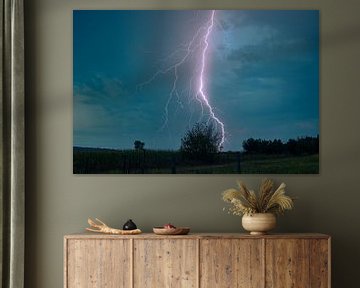Nearby lightning strike in the countryside by Menno van der Haven
