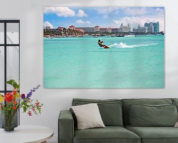 Kite surfing on the Caribbean Sea at Palm Beach on Aruba by Eye on You
