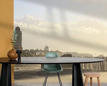 Beach with Old church (Andreaskerk) and lighthouse in Katwijk aan zee by O uwehand