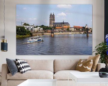Magdeburg on the Elbe with tourist ship by Frank Herrmann