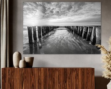 Breakwaters on the beach of Domburg IX in black and white by Martijn van der Nat
