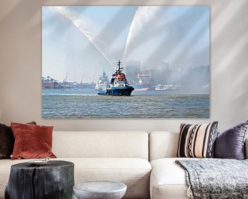 Water spraying firefighting boat in the port of Rotterdam in the Netherlands by Eye on You