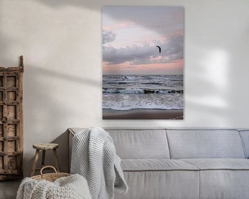 Kitesurfing, the beach, the sea and a beautiful pastel-colored sunset