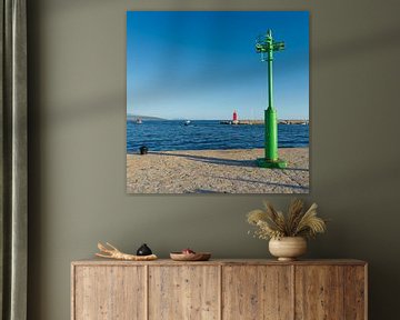 green lighthouse in the port of the town of Krk in Croatia by Heiko Kueverling