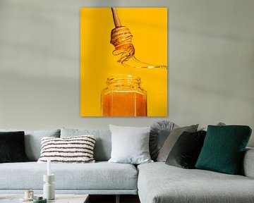 Photographie alimentaire de tourbillon de miel abstrait sur butfirstsalt