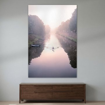 Aviron dans le brouillard du matin