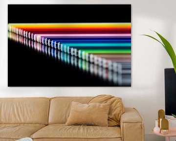 Pencils in a row. by Ronald van Kooten