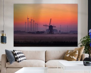 Windmühle bei Hellouw mit aufgehender Sonne von Rob Jansen