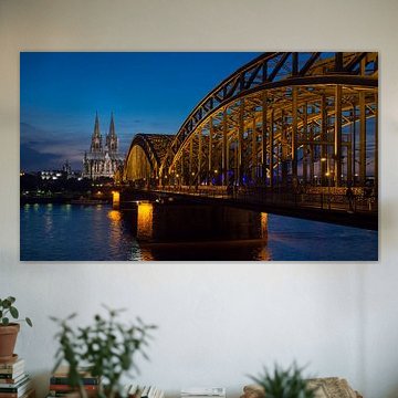 Cologne Cathedral on the Rhine by night by Jörg B. Schubert