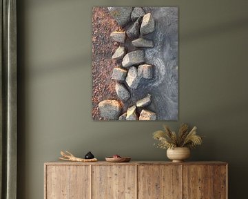 Stone deer on the beach