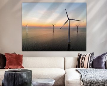 Wind turbines in an offshore wind park producing electricity sunset by Sjoerd van der Wal