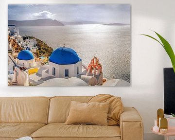 Church in Oia with blue dome on Santorini island. by Voss Fine Art Fotografie