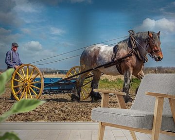 Farmer with draft horse by Lisette van Peenen