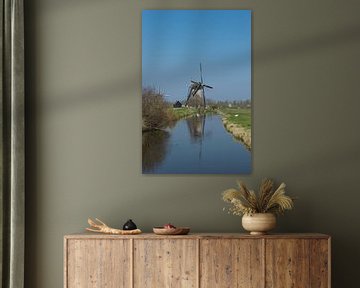 Mooie windmolen Kinderdijk met een mooie weerspiegeling in het water van Patrick Verhoef