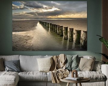 Poles in the water of Westenschouwen, Zeeland by Paula Romein