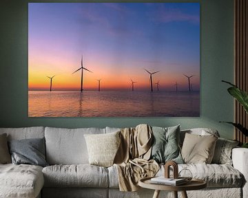 Windmolens in een offshore windpark tijdens zonsondergang van Sjoerd van der Wal
