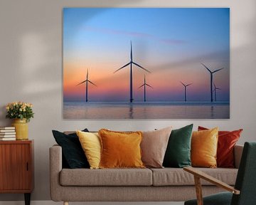 Windmolens in een offshore windpark tijdens zonsondergang van Sjoerd van der Wal