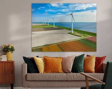 Tulips fields with wind turbines in the background seen from above by Sjoerd van der Wal