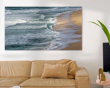 Waves on a golden sandy beach by Jonas Weinitschke