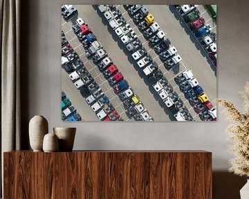 Trucks in a row at a parking lot seen from above by Sjoerd van der Wal Photography