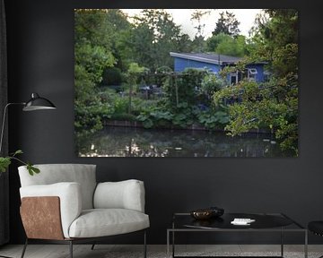 blue gazebo in the forest along the waterfront