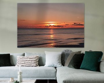 On the beach of Blåvand at sunset by the sea by Martin Köbsch