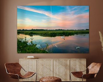 Roze avondlucht boven het polder landschap van Menno van der Haven